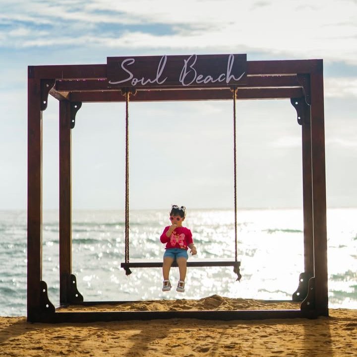 Soul Beach Colombo - Child on beach swing